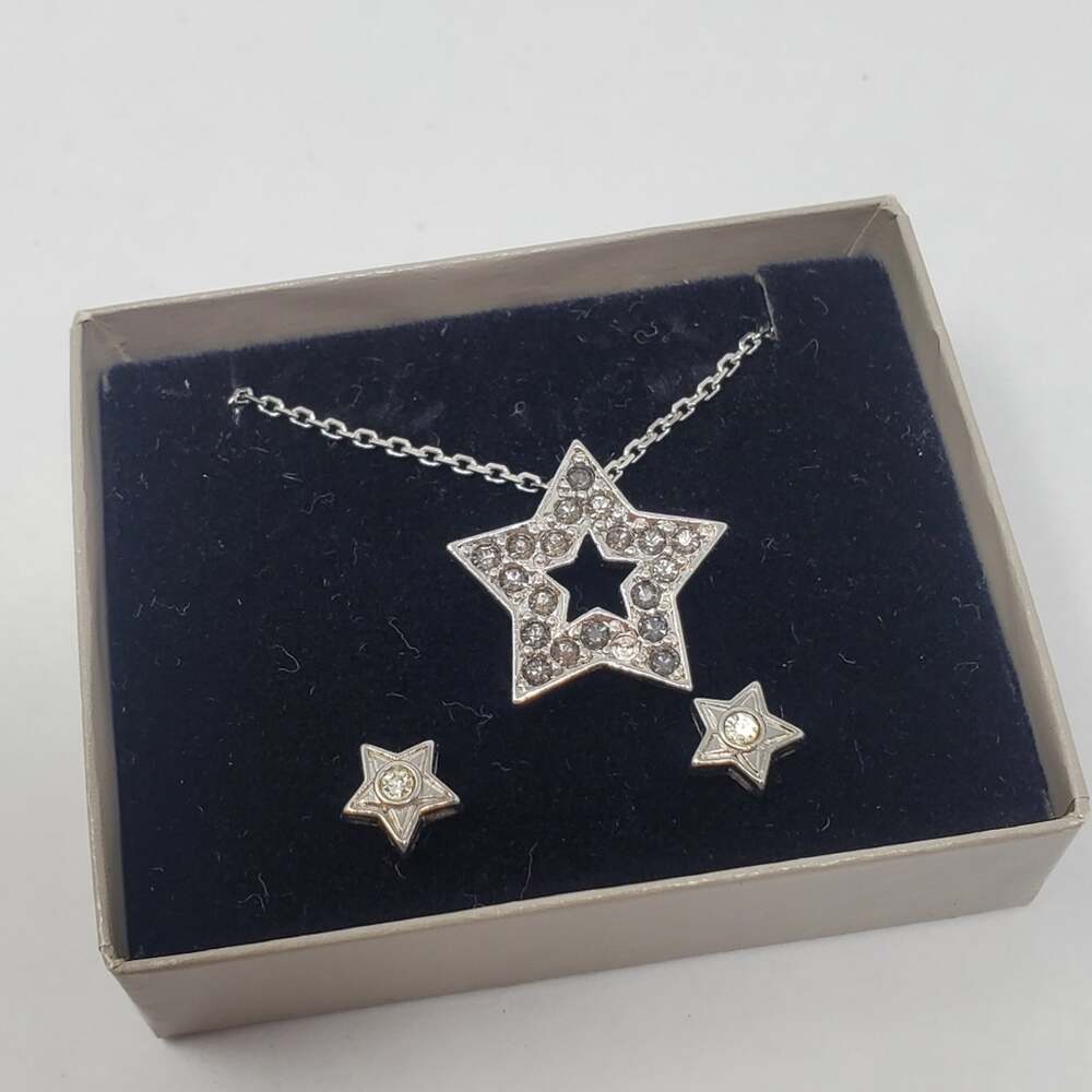Avon New in Box silver tone metal/Rhinestone Star necklace & Matching earrings